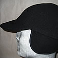 witting basecap met oorklep
